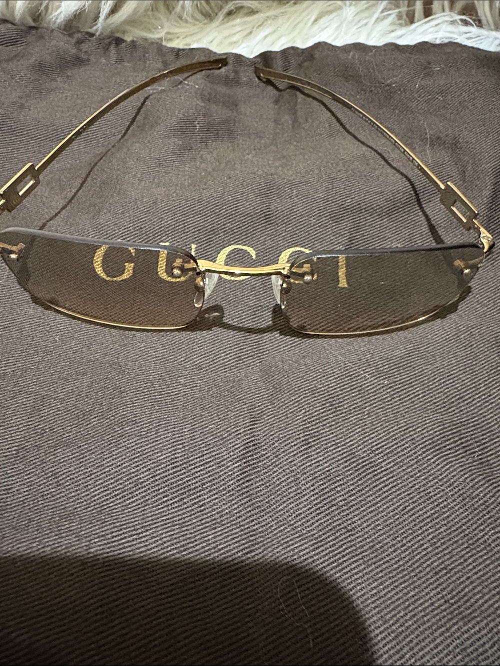 Gucci vintage Rimless Sunglasses in Gold with Brown Lenses